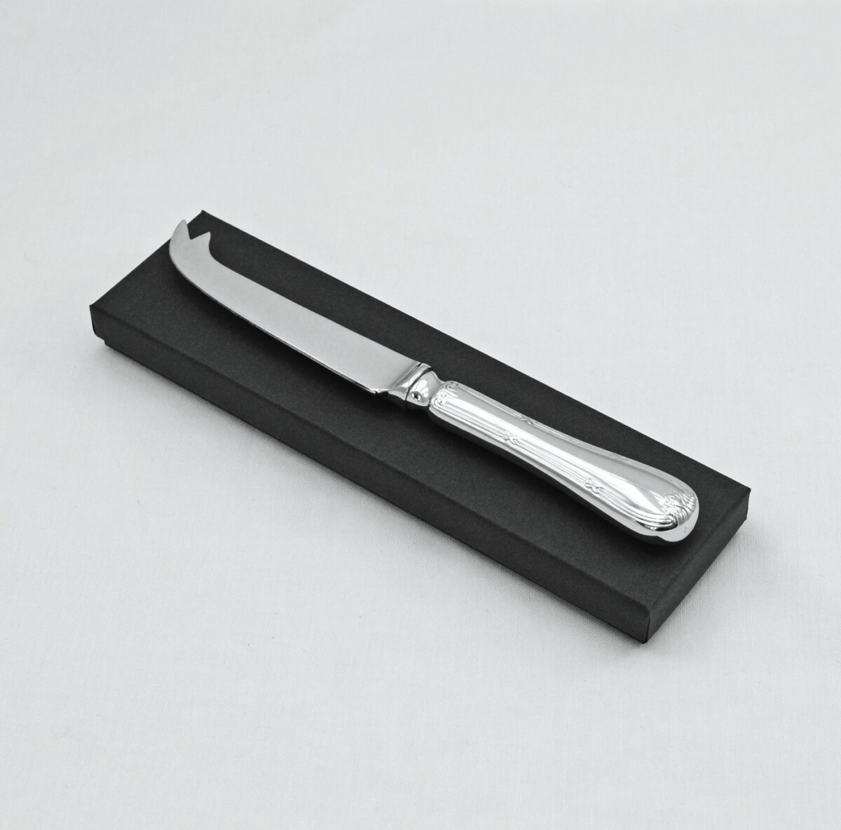 An Empire Pattern Stainless Steel Cheese Knife Gift Boxed