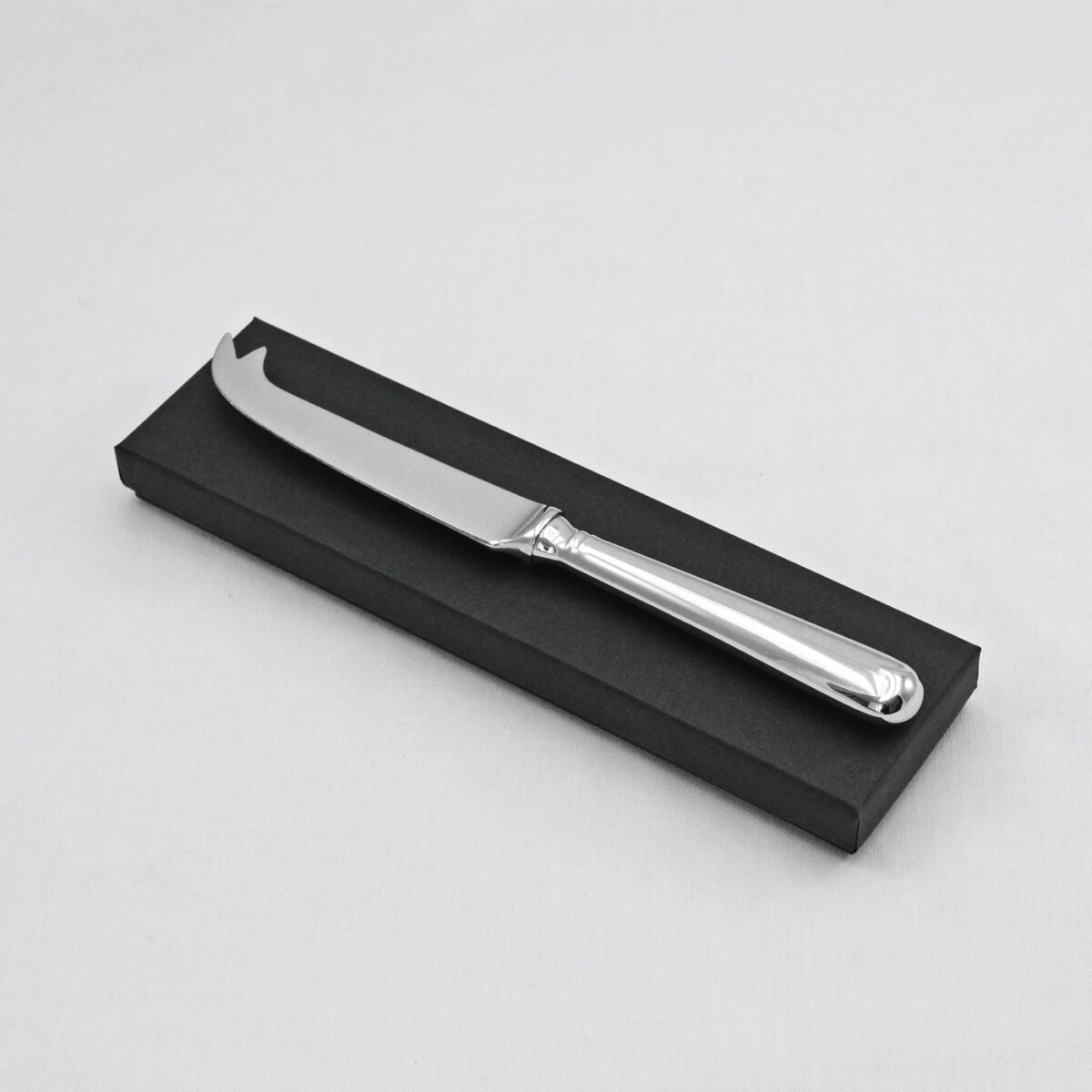 An Old English Pip Pattern Stainless Steel Cheese Knife Gift Boxed