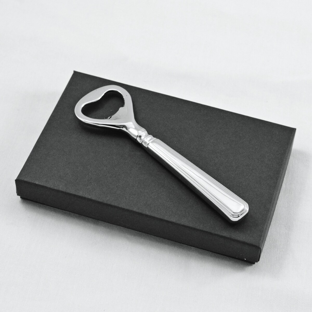 An Athenian Pattern Stainless Steel Bottle Opener Gift Boxed