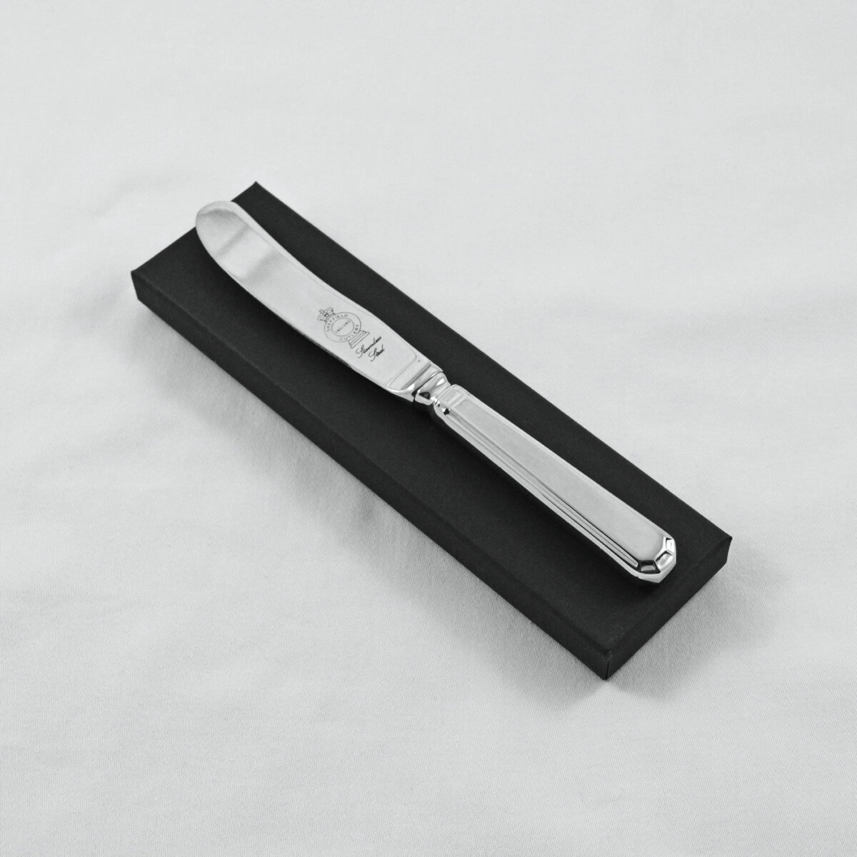 A Grecian Pattern Stainless Steel Butter Knife Gift Boxed And Engraved 'Sheffield, England'