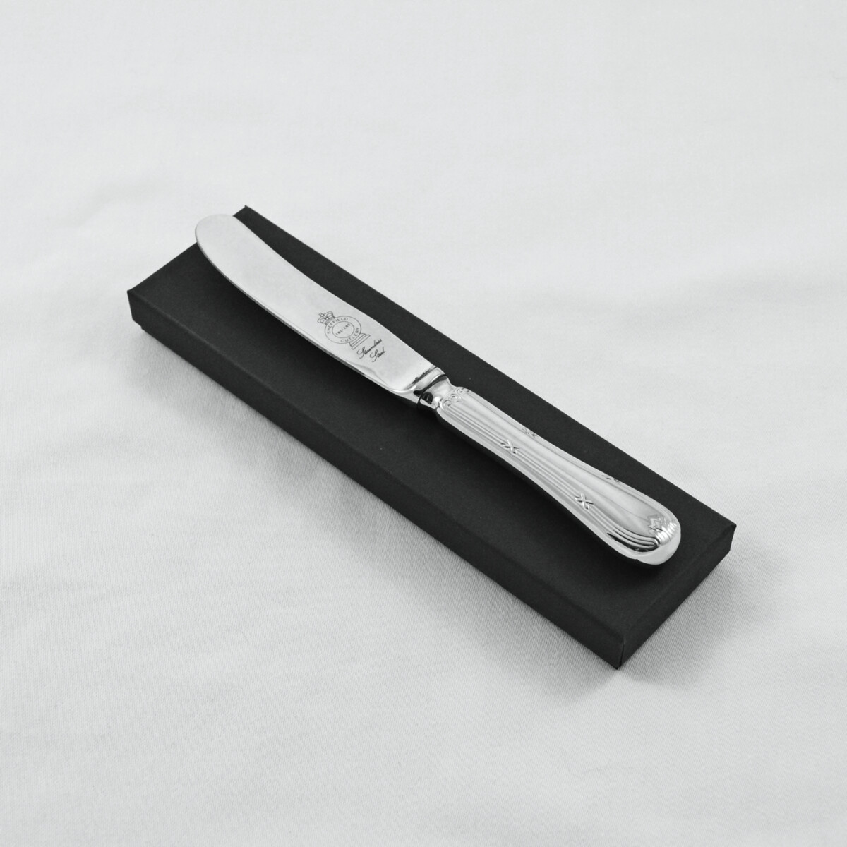 An Empire Pattern Stainless Steel Butter Knife Gift Boxed And Engraved 'Sheffield, England'