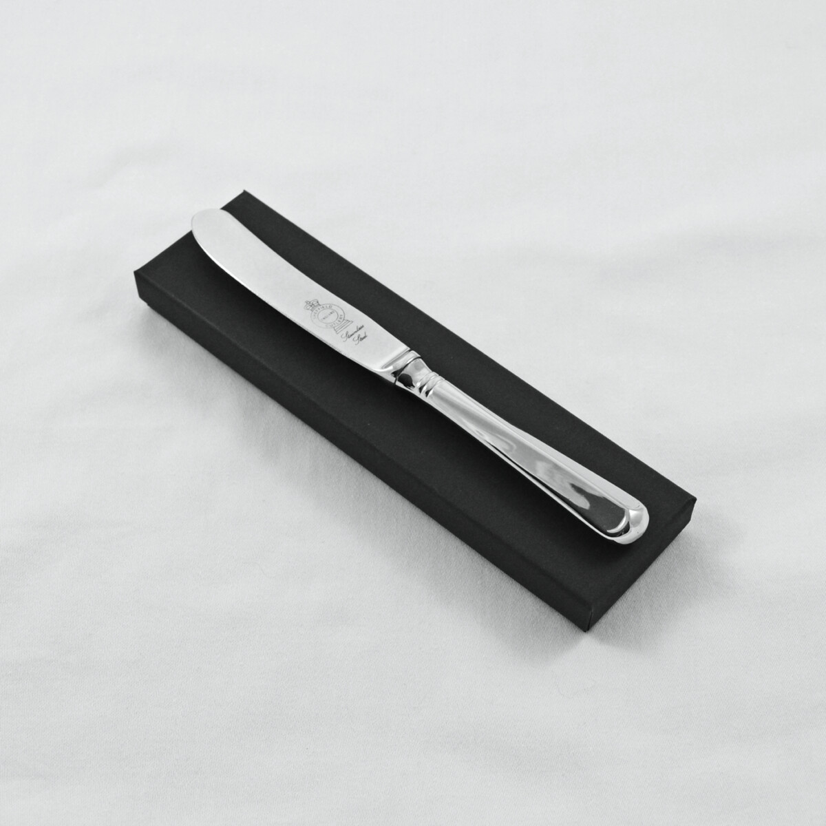 A Rattail Pattern Stainless Steel Butter Knife Gift Boxed And Engraved 'Sheffield, England'
