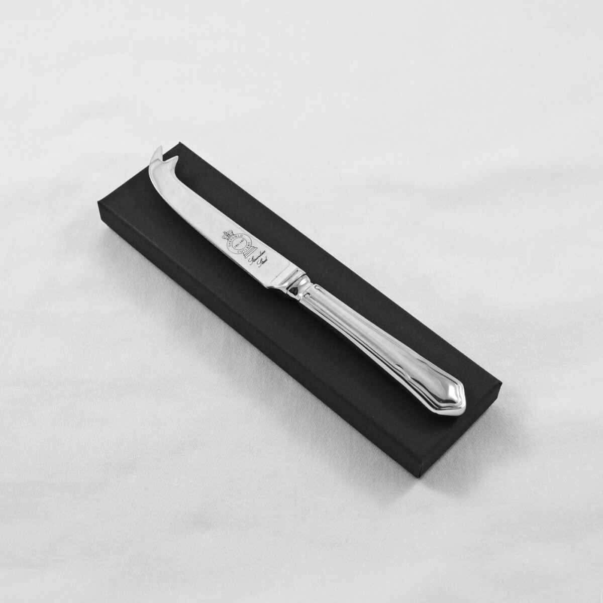 A Dubarry Pattern Stainless Steel Cheese Knife Gift Boxed And Engraved 'Sheffield, England'