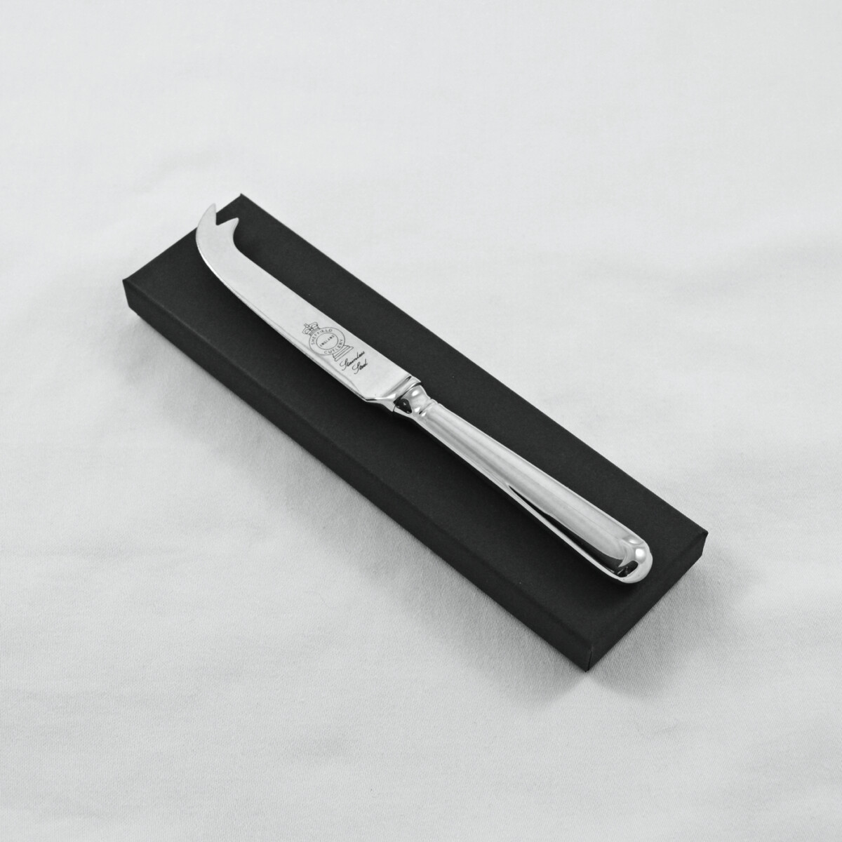 An Old English Pip Pattern Stainless Steel Cheese Knife Gift Boxed And Engraved 'Sheffield, England'