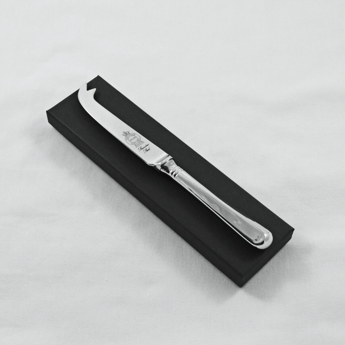 A Rattail Pattern Stainless Steel Cheese Knife Gift Boxed And Engraved 'Sheffield, England'