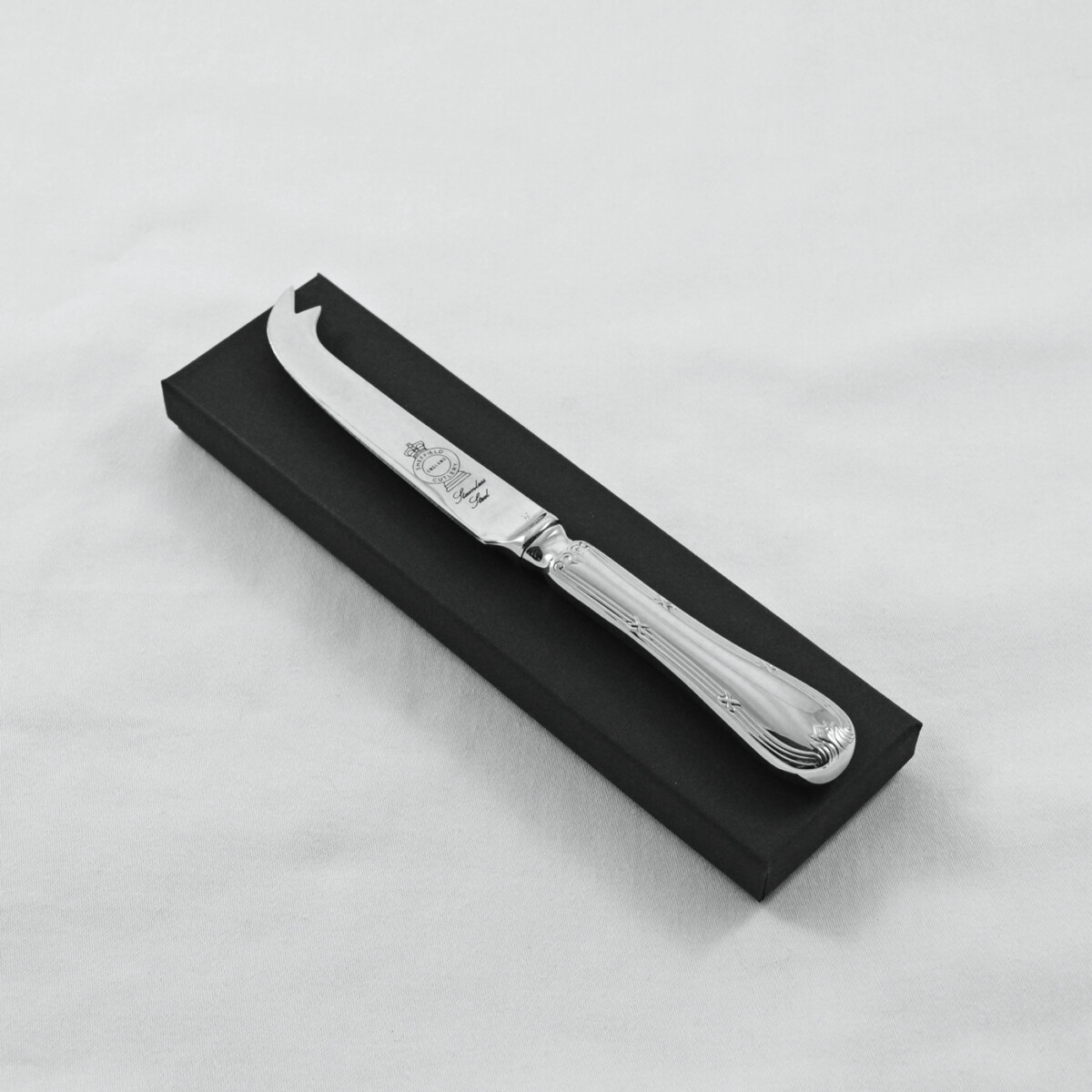 An Empire Pattern Stainless Steel Cheese Knife Gift Boxed And Engraved 'Sheffield, England'