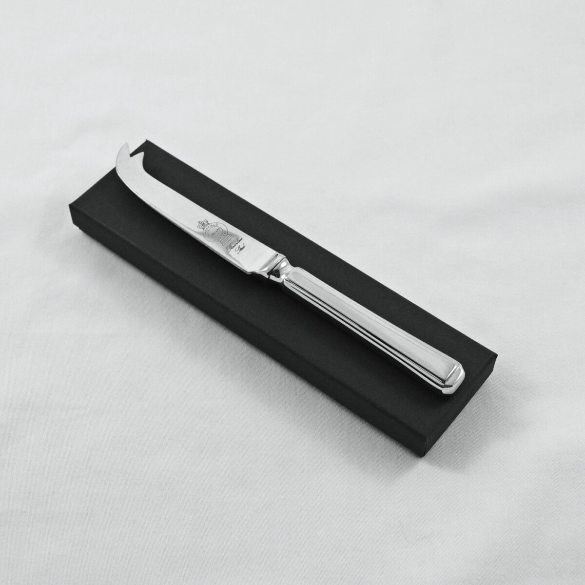 A Harley Pattern Stainless Steel Cheese Knife Gift Boxed And Engraved 'Sheffield, England'