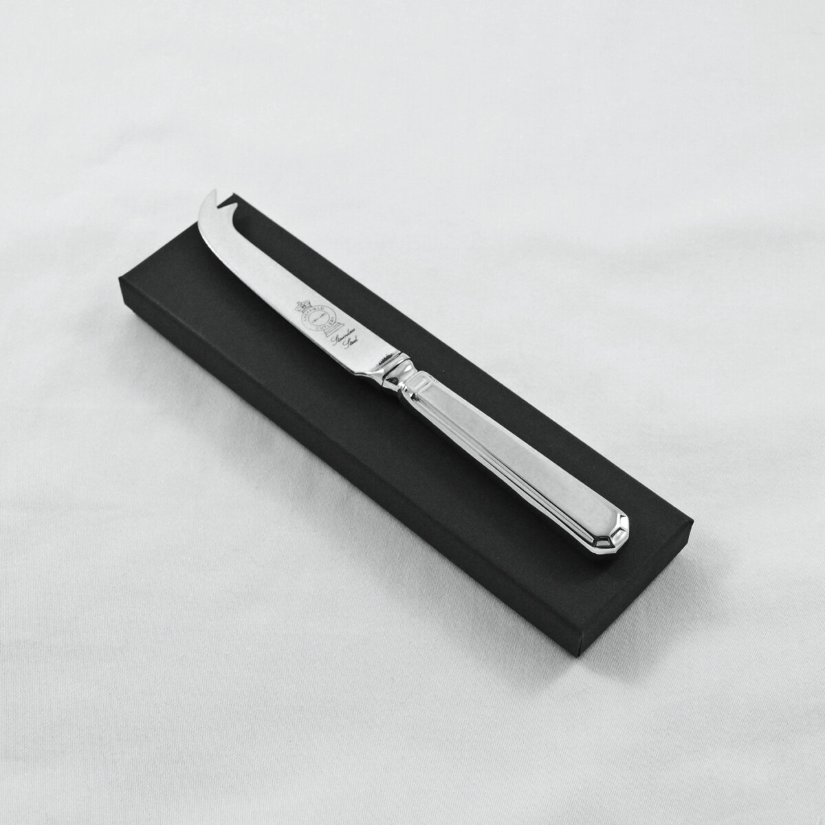 A Grecian Pattern Stainless Steel Cheese Knife Gift Boxed And Engraved 'Sheffield, England'
