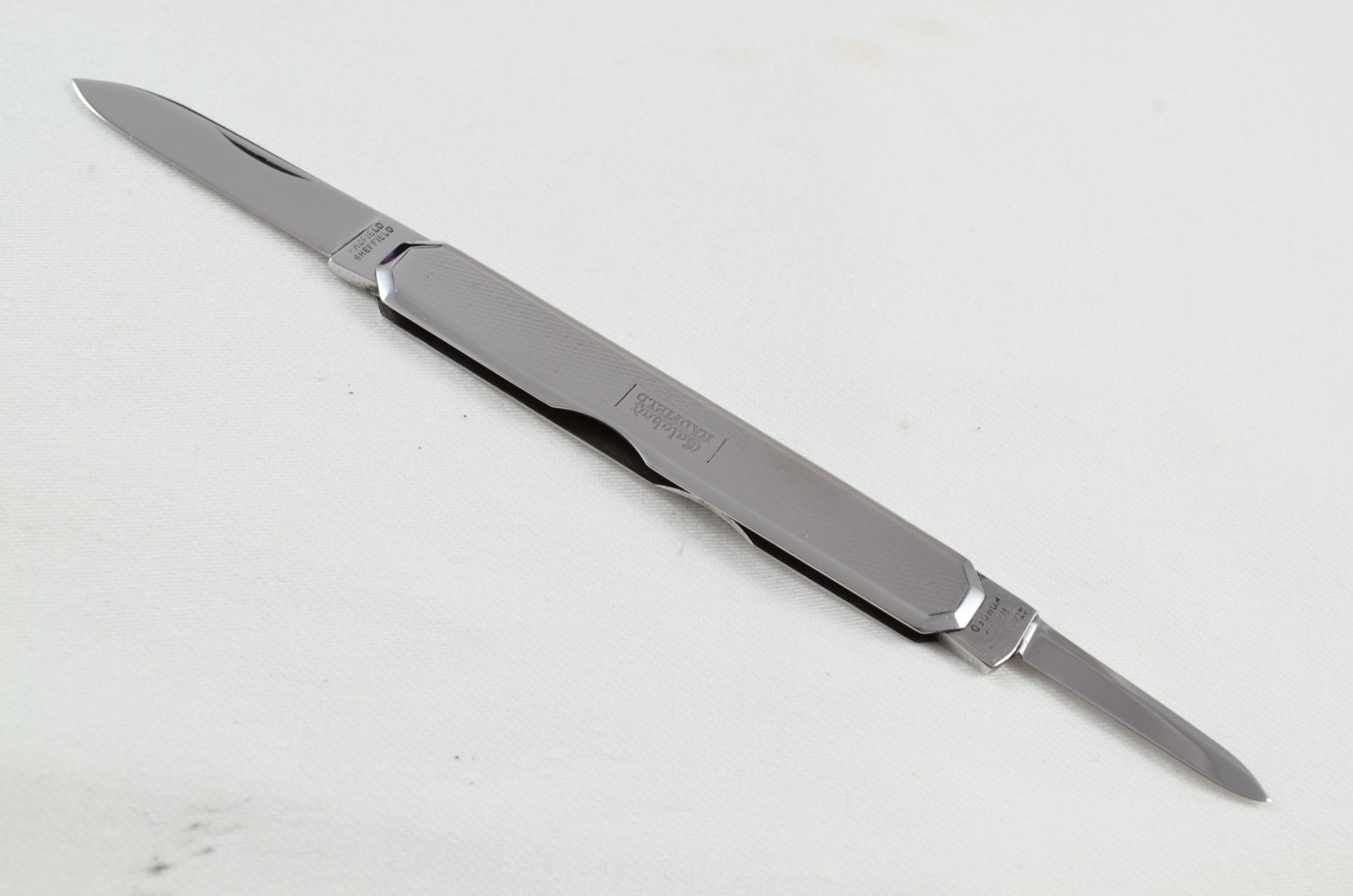A Hadfield, Sheffield Engine Turned Stainless Steel Pocket Pen Knife