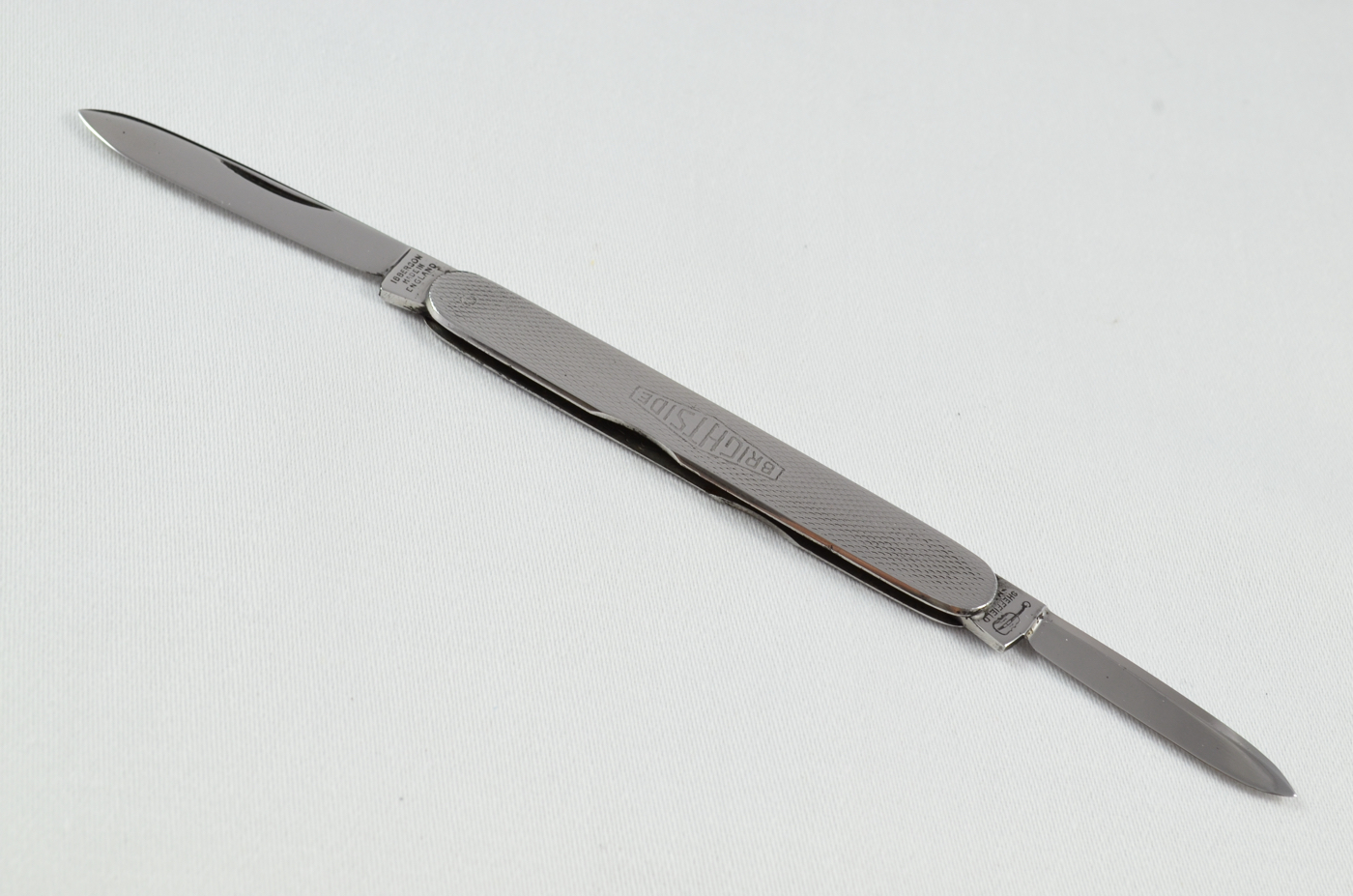 An Ibberson Folding Engine Turned Stainless Steel Pocket Pen Knife Sheffield
