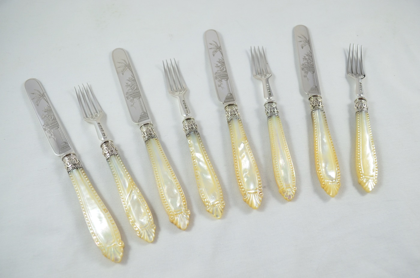 A RARE Hand Engraved Solid Silver and Hand Carved Mother of Pearl Set of 4 Knives & 4 Forks Assayed 1870