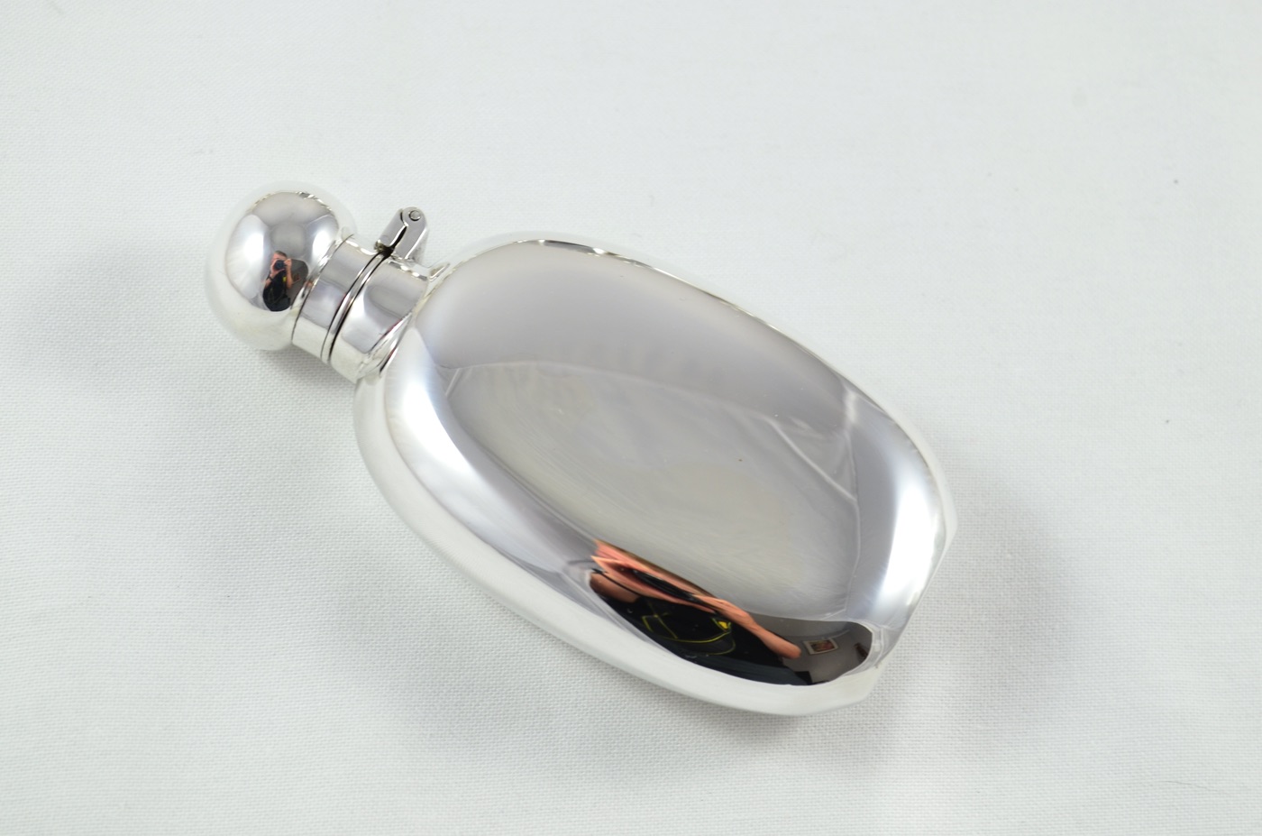 A Sterling Silver Oval Hip Flask 2oz Bayonet Top Hallmarked 2024