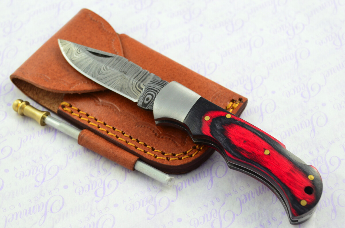 A Handmade Damascus Steel Pocket Knife - Red & Black Laminate Wood Scales