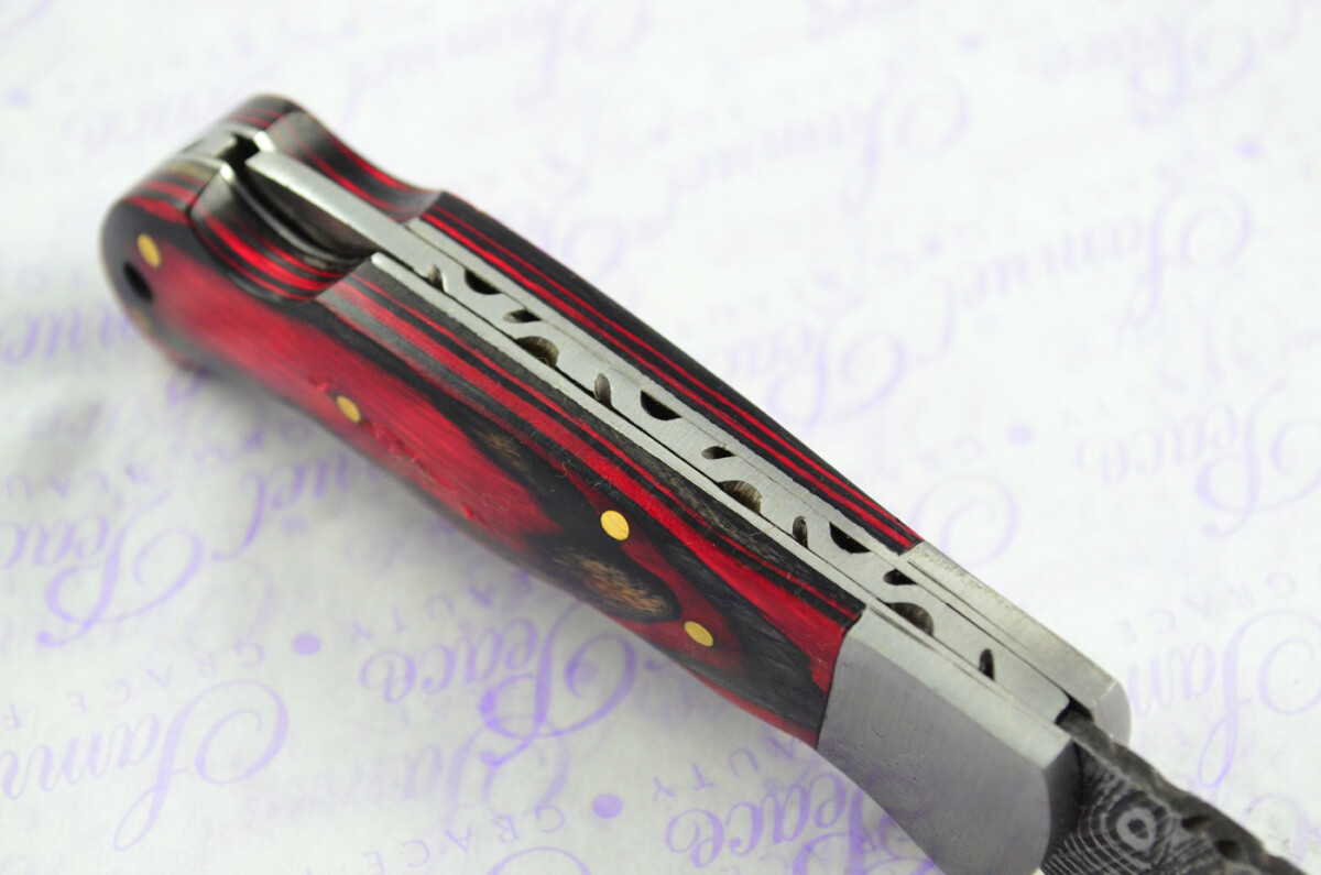 A Handmade Damascus Steel Pocket Knife - Red & Black Laminate Wood Scales - Image 6