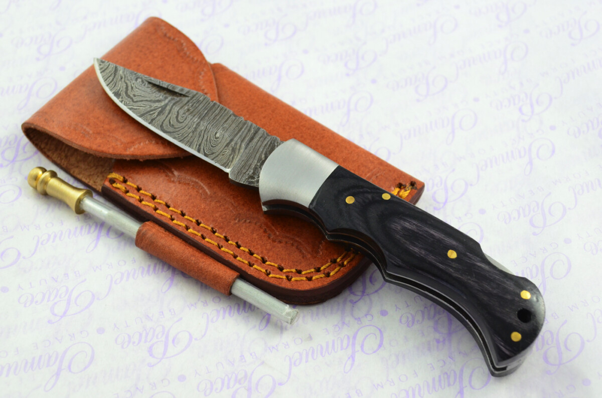 A Handmade Damascus Steel Pocket Knife - Black Stealth Laminate Wood Scales