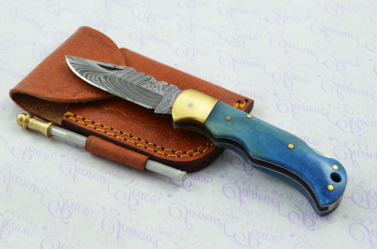 A Handmade Damascus Steel Pocket Knife - Blue Camel Scales