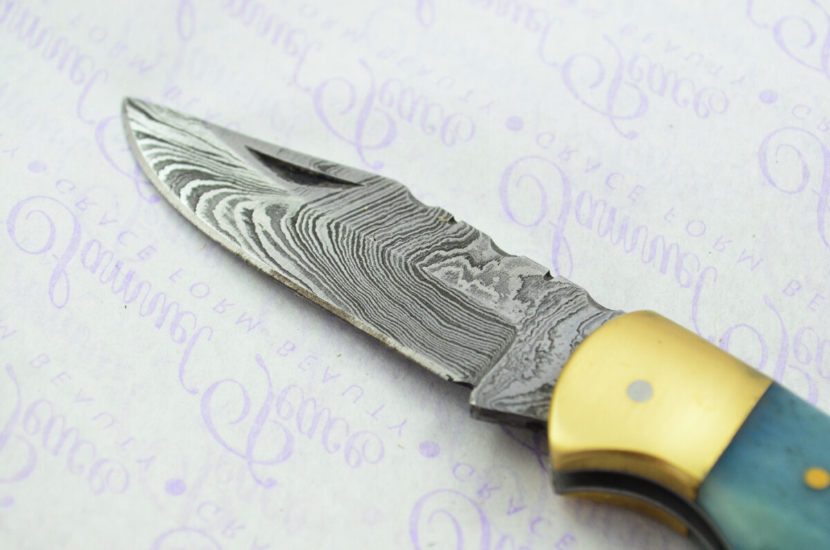 A Handmade Damascus Steel Pocket Knife - Blue Camel Scales - Image 4