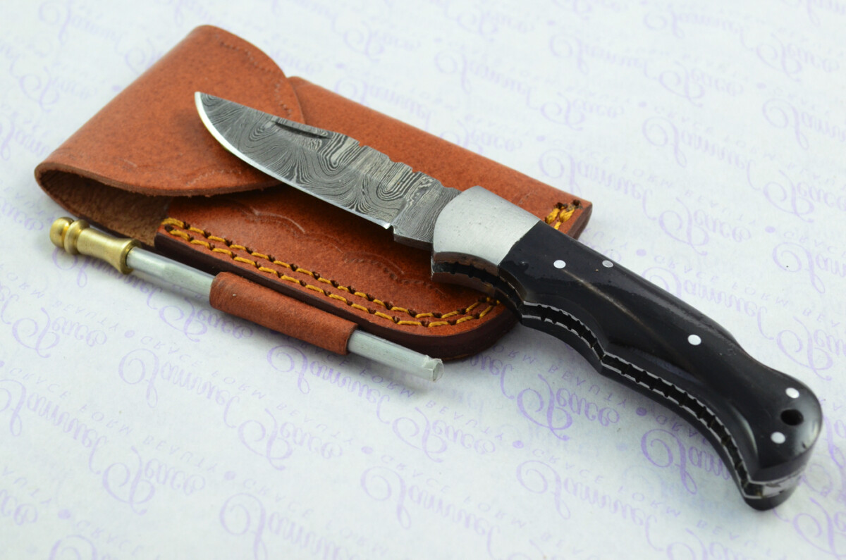 A Handmade Damascus Steel Pocket Knife - Buffalo Horn Scales