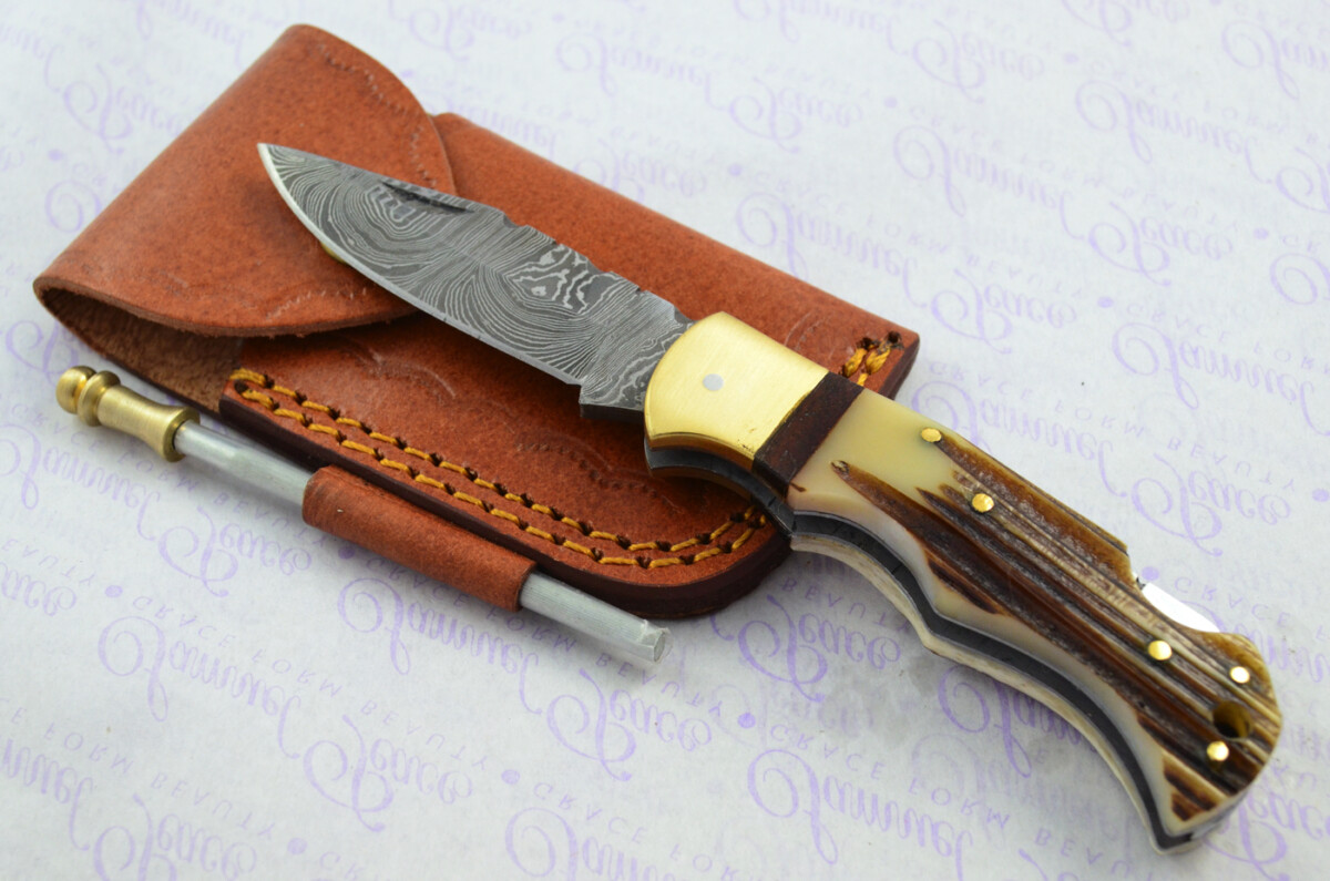 A Handmade Damascus Steel Pocket Knife - Stag Horn Scales