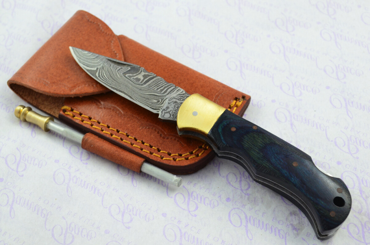 A Handmade Damascus Steel Pocket Knife - Teal Laminate Wood Scales
