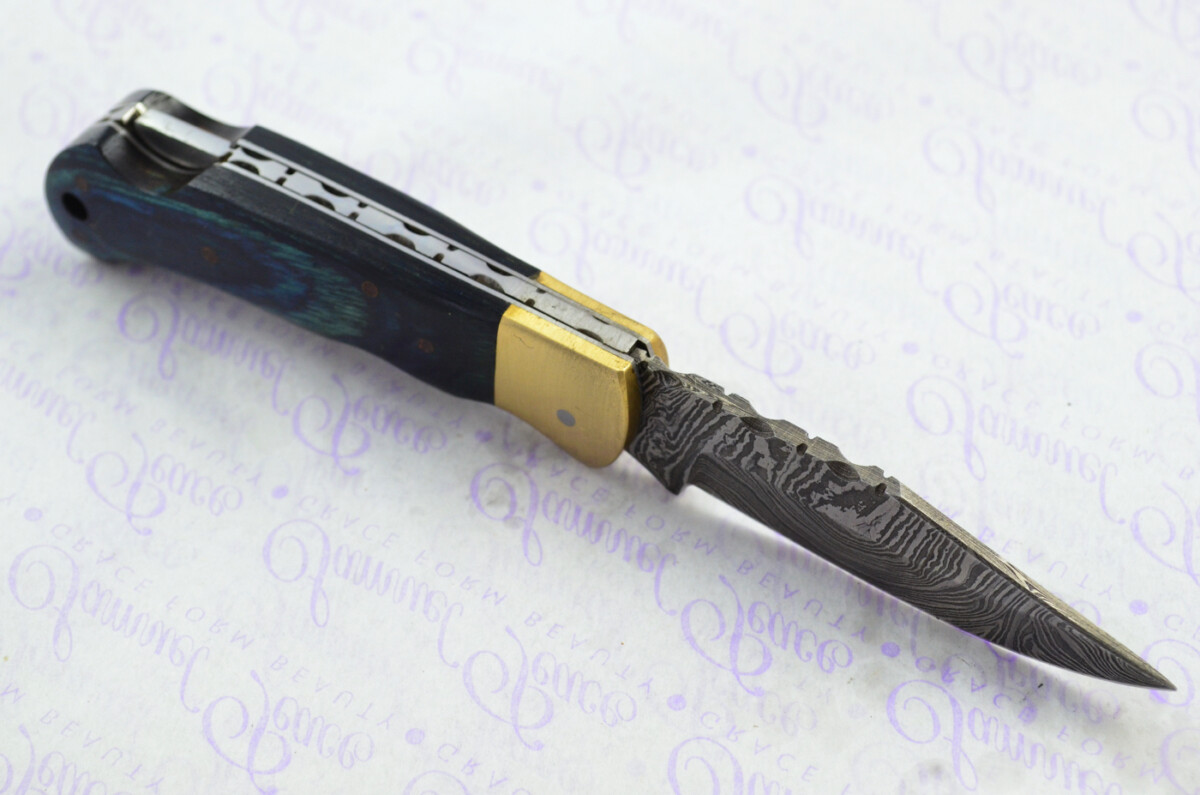 A Handmade Damascus Steel Pocket Knife - Teal Laminate Wood Scales - Image 5