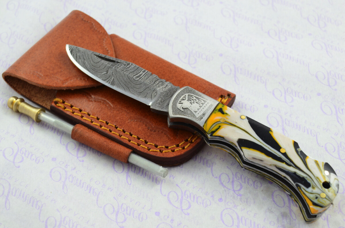 A Handmade Damascus Steel Pocket Knife - White Mustard Black Resin Scales