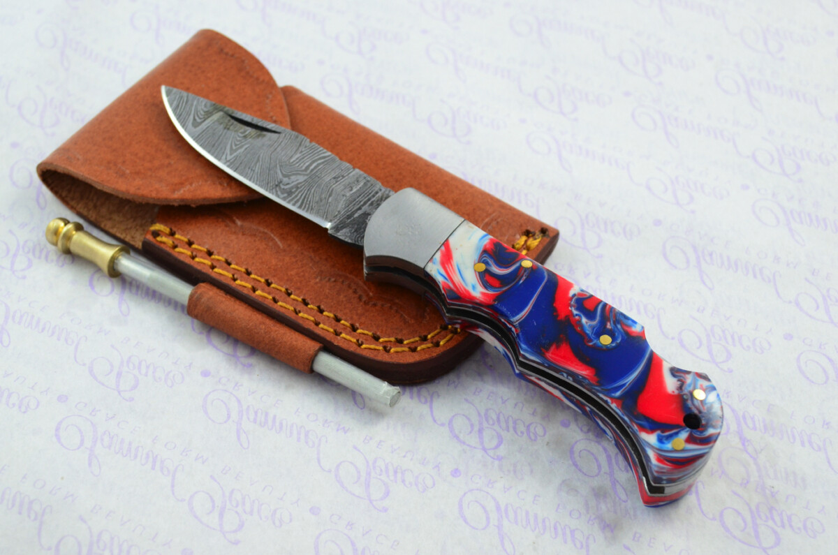 A Handmade Damascus Steel Pocket Knife - Americana Resin Scales
