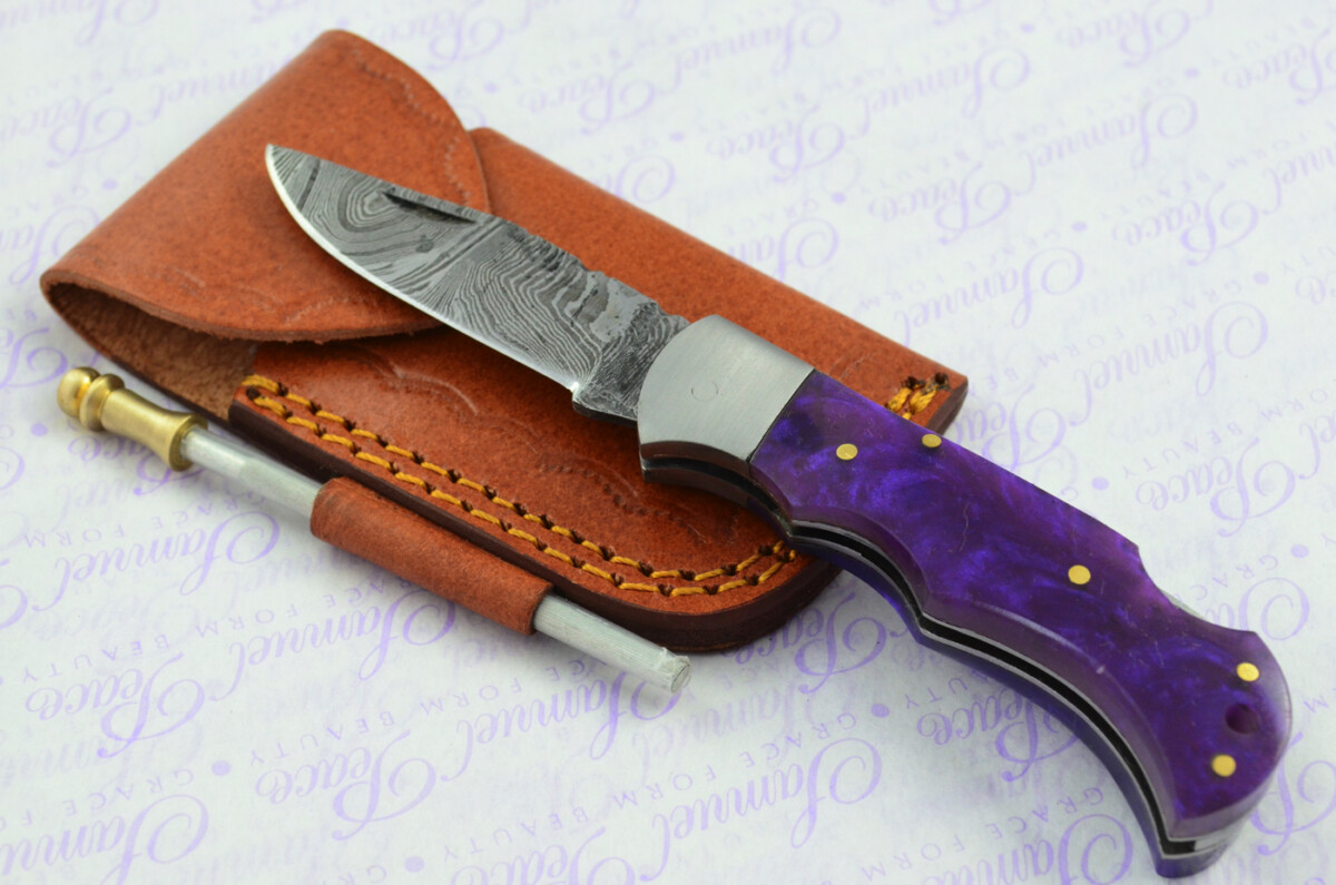A Handmade Damascus Steel Pocket Knife - Purple Resin Scales