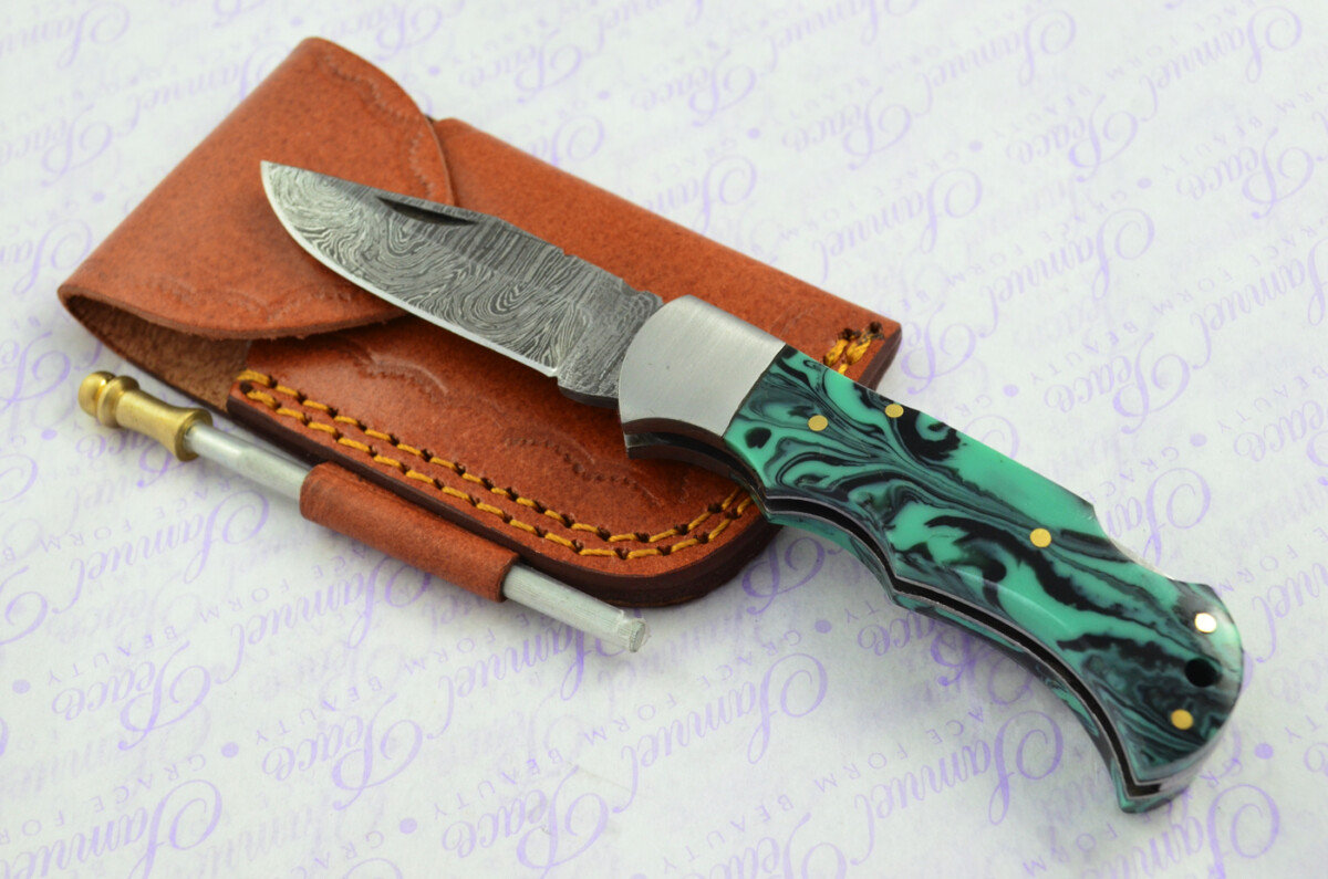 A Handmade Damascus Steel Pocket Knife - Turquoise & Black Resin Scales
