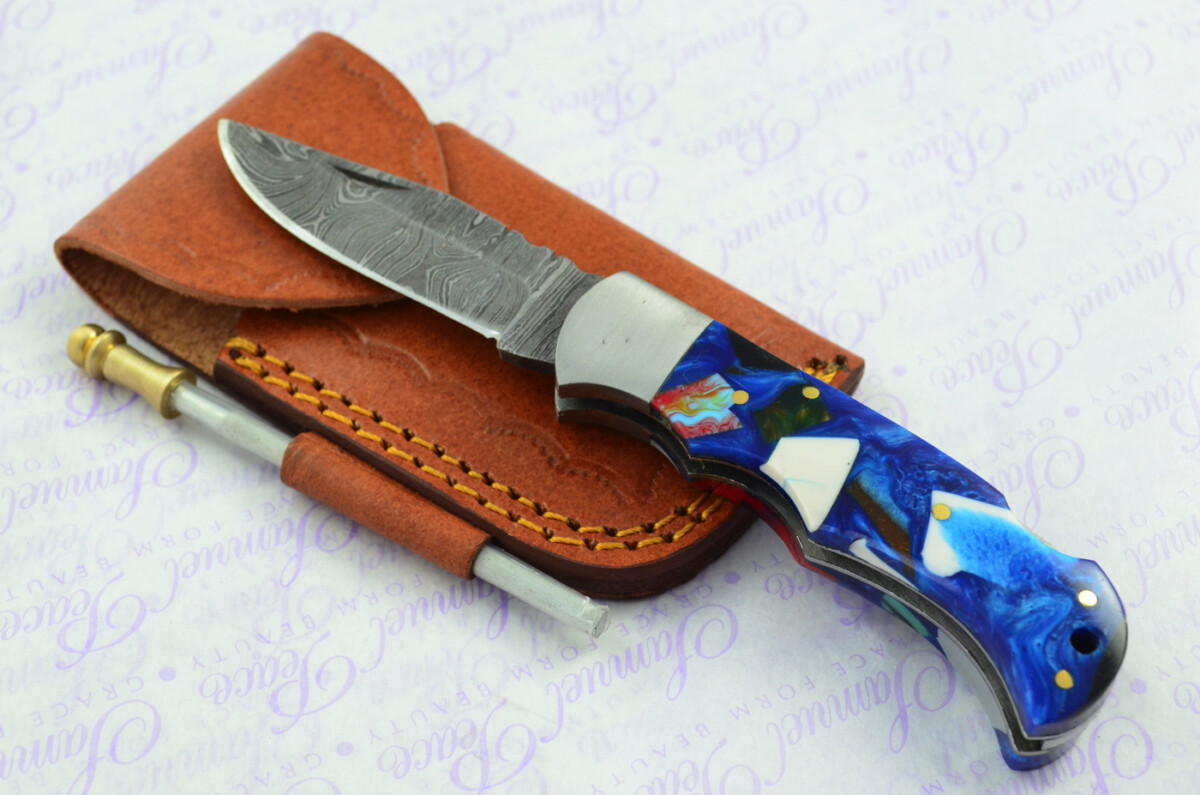 A Handmade Damascus Steel Pocket Knife -  Resin Scales