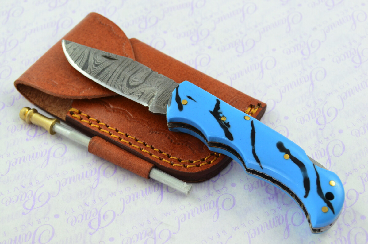A Handmade Damascus Steel Pocket Knife -  Resin Scales