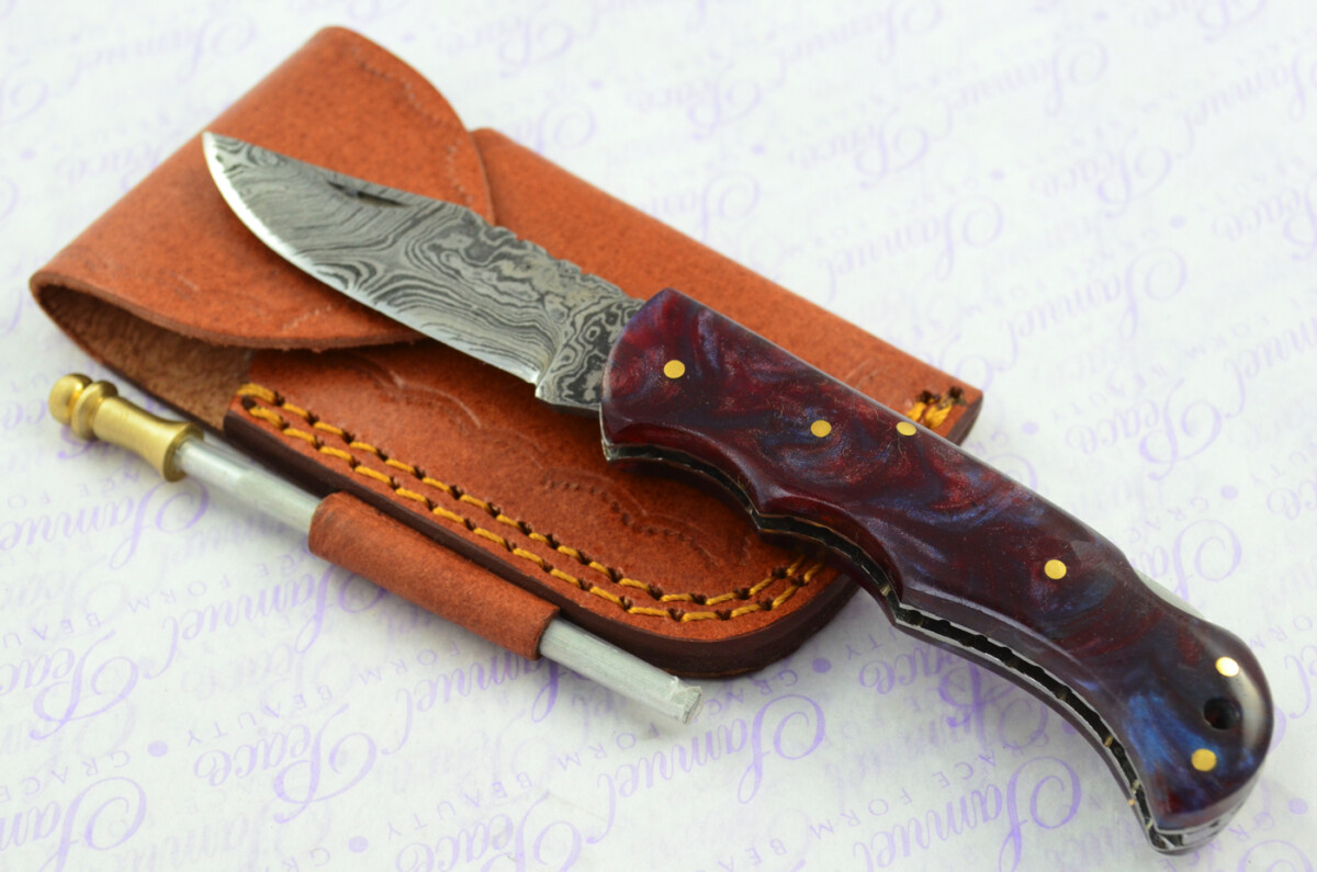 A Handmade Damascus Steel Pocket Knife -  Resin Scales
