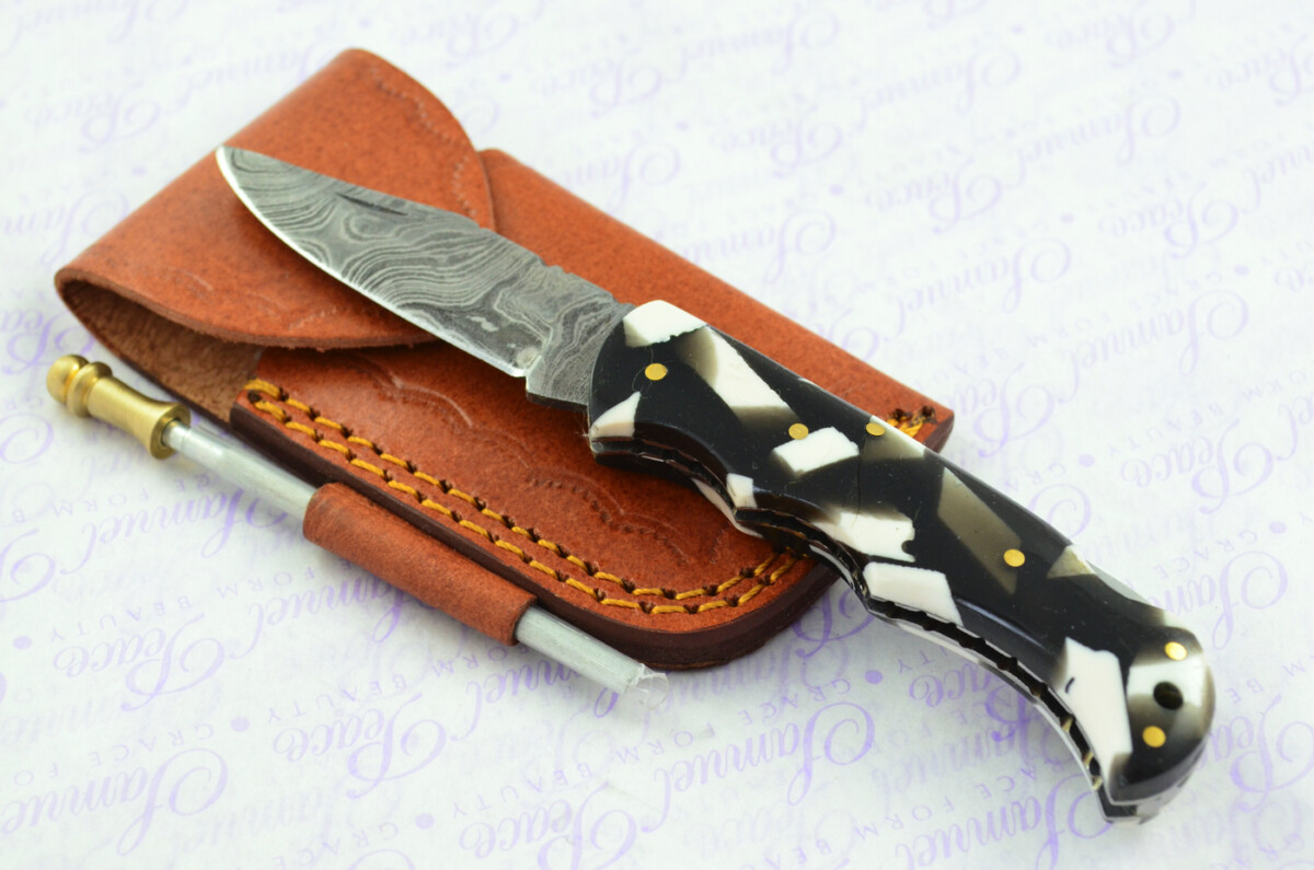 A Handmade Damascus Steel Pocket Knife -  Resin Scales