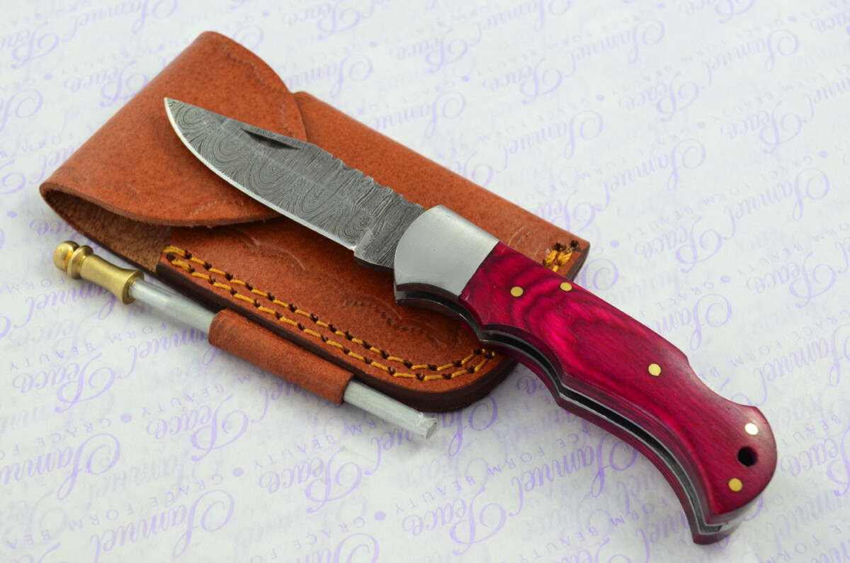 A Handmade Damascus Steel Pocket Knife - Magenta Laminate Wood Scales