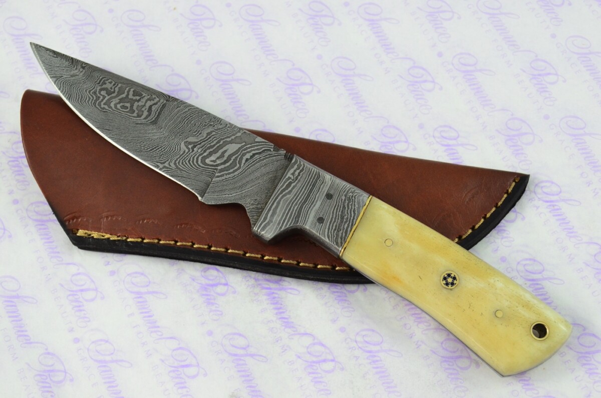 Astounding Damascus Steel Hunting Knife with Camel Bone Scales inc Leather Sheath