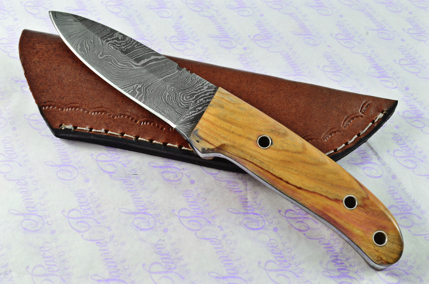 Astounding Damascus Steel Bushcraft Knife with Olive Wood Scales