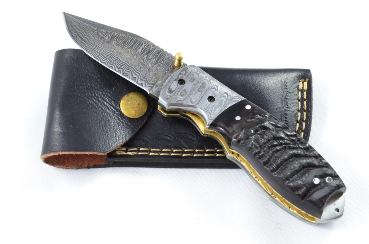 A Beautiful Handmade Damascus Steel Bladed Engraved Rams Horn Scaled Pocket Knife