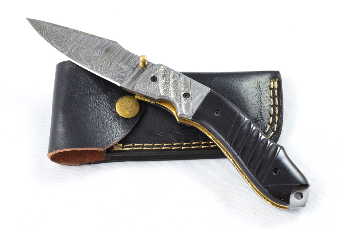A Beautiful Handmade Damascus Steel Bladed Engraved Buffalo Horn Scaled Pocket Knife