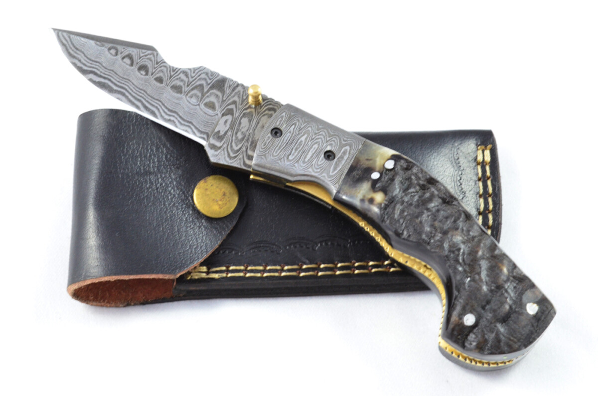 A Beautiful Handmade Damascus Steel Bladed Engraved Rams Horn Scaled Pocket Knife