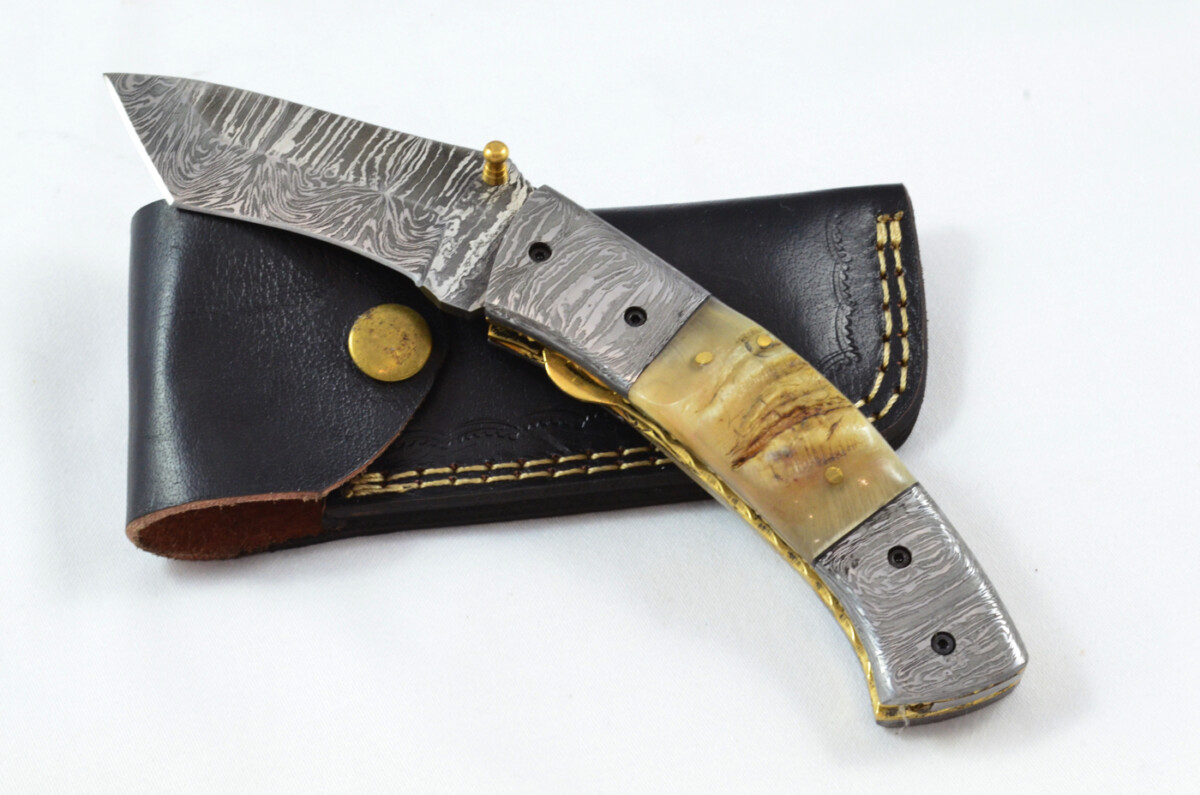 A Beautiful Handmade Damascus Steel Bladed Engraved Rams Horn Scaled Pocket Knife
