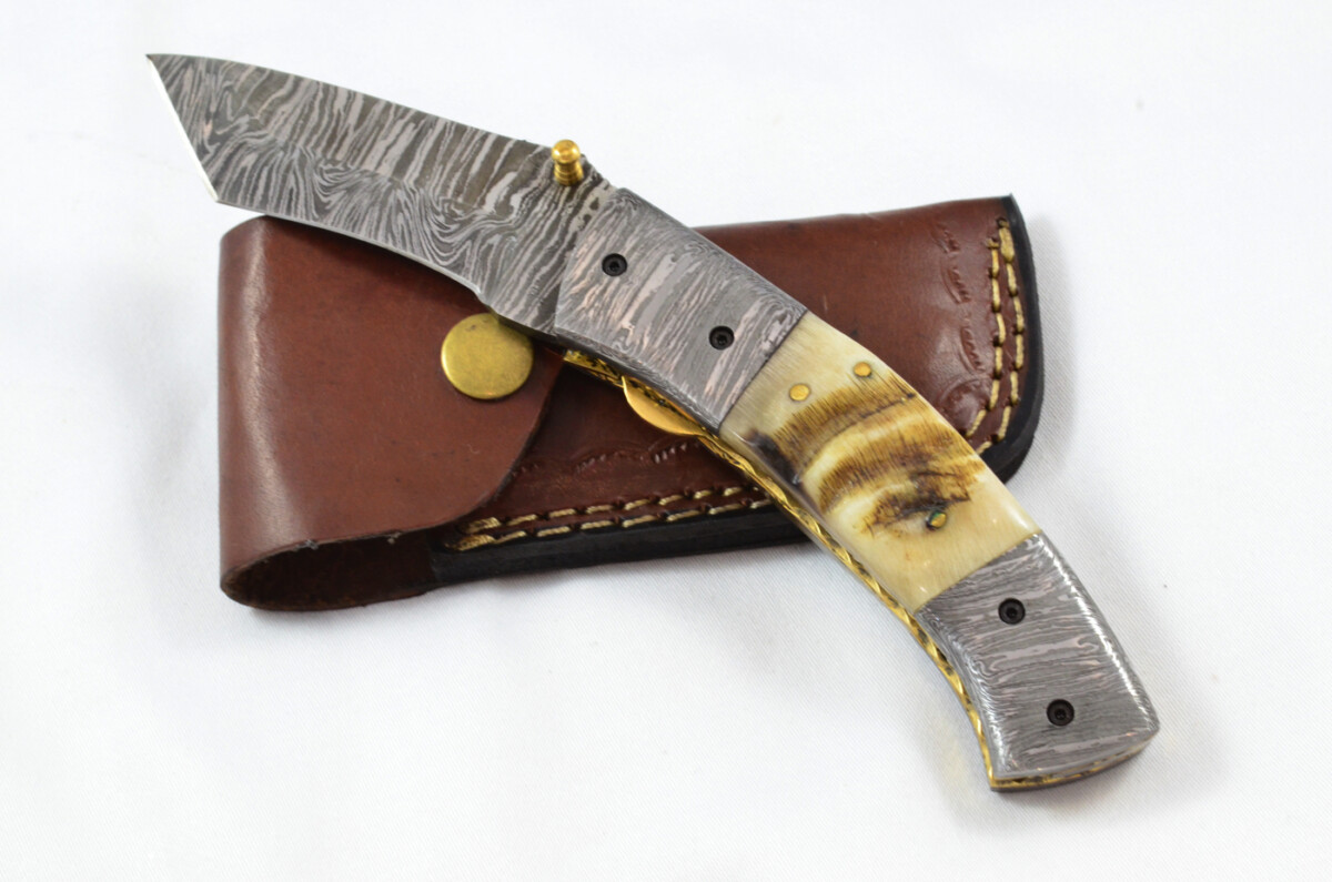 A Beautiful Handmade Damascus Steel Bladed Engraved Rams Horn Scaled Pocket Knife