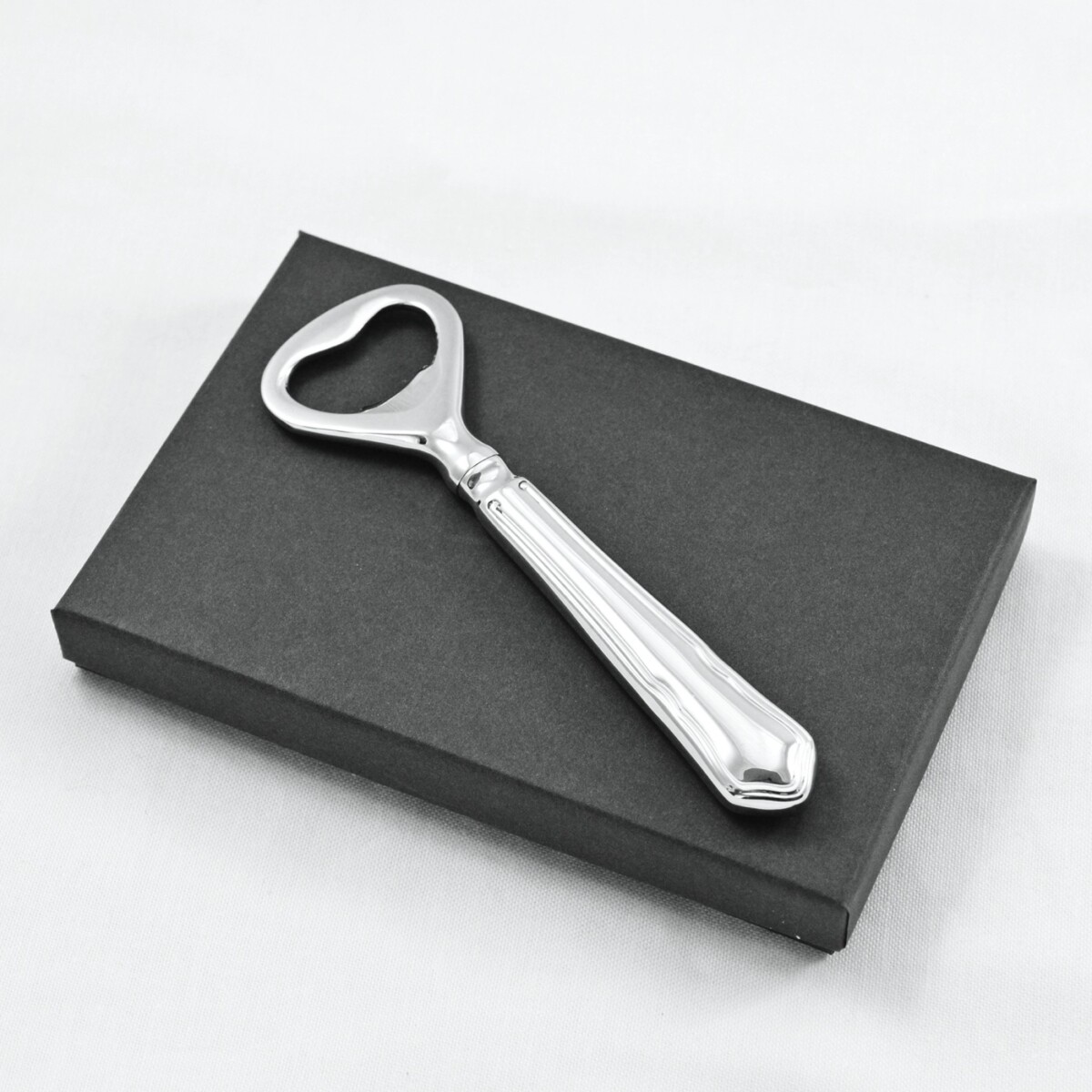 A Dubarry Pattern Stainless Steel Bottle Opener Gift Boxed