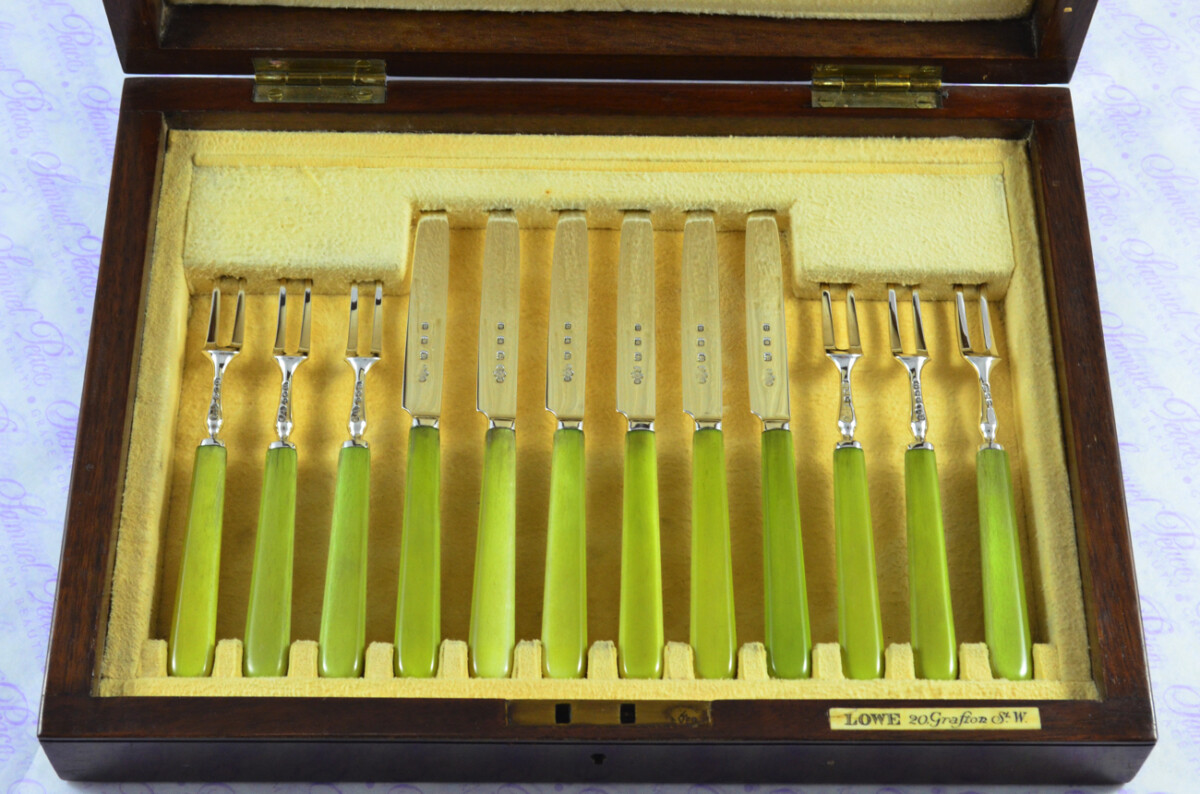 ERNEST J LOWE 6 PAIRS CARVED STAINED IVORY & STERLING SILVER KNIVES & FORKS LONDON 1929