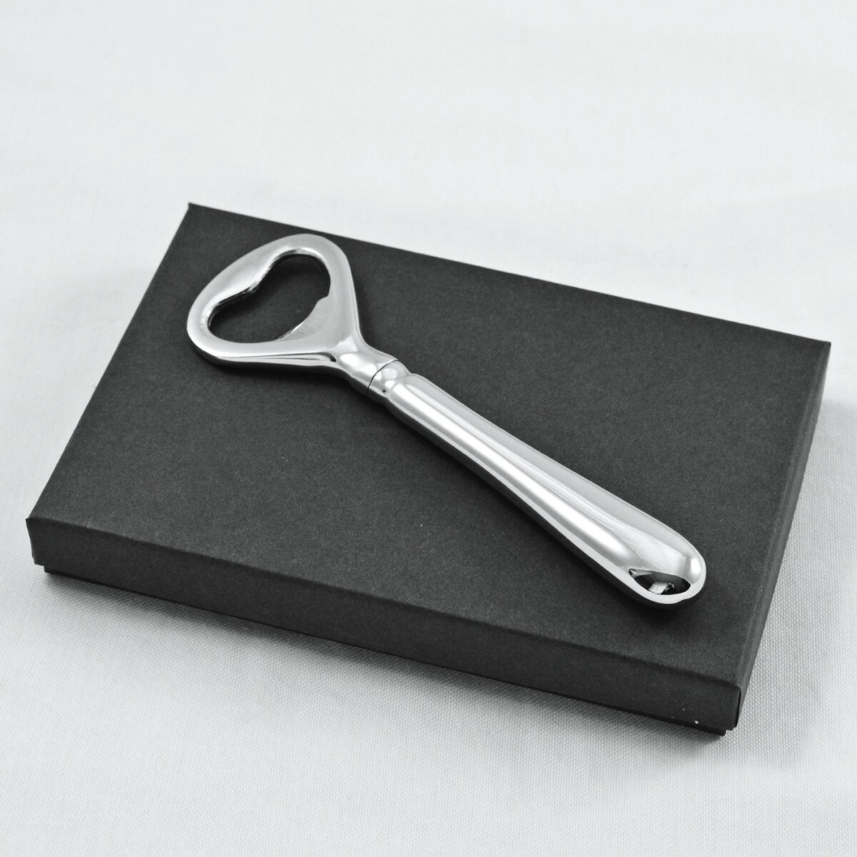 An Old English Pattern Stainless Steel Bottle Opener Gift Boxed