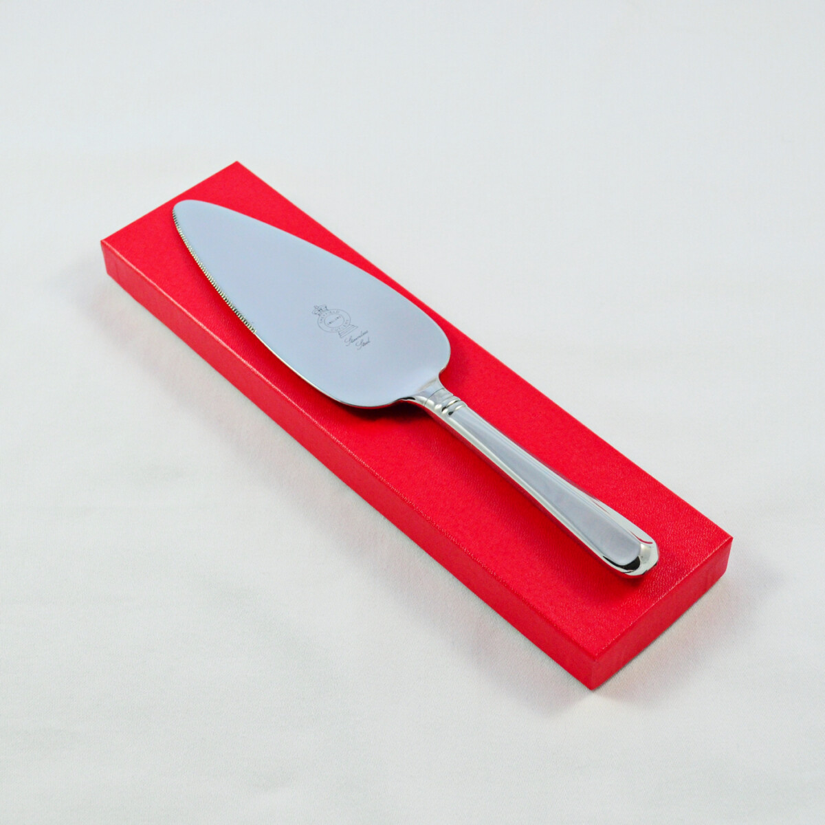 A Rattail Pattern Stainless Steel Pie/Cake Server Gift Boxed And Engraved 'Sheffield, England'