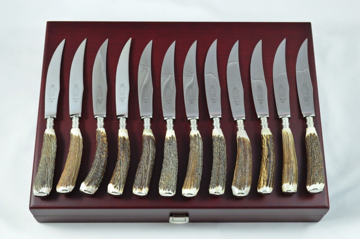 A Set of 12 Sheffield Silver Ferruled Steak Knives with Red Deer Stag Antler Handles – Wooden Presentation Case