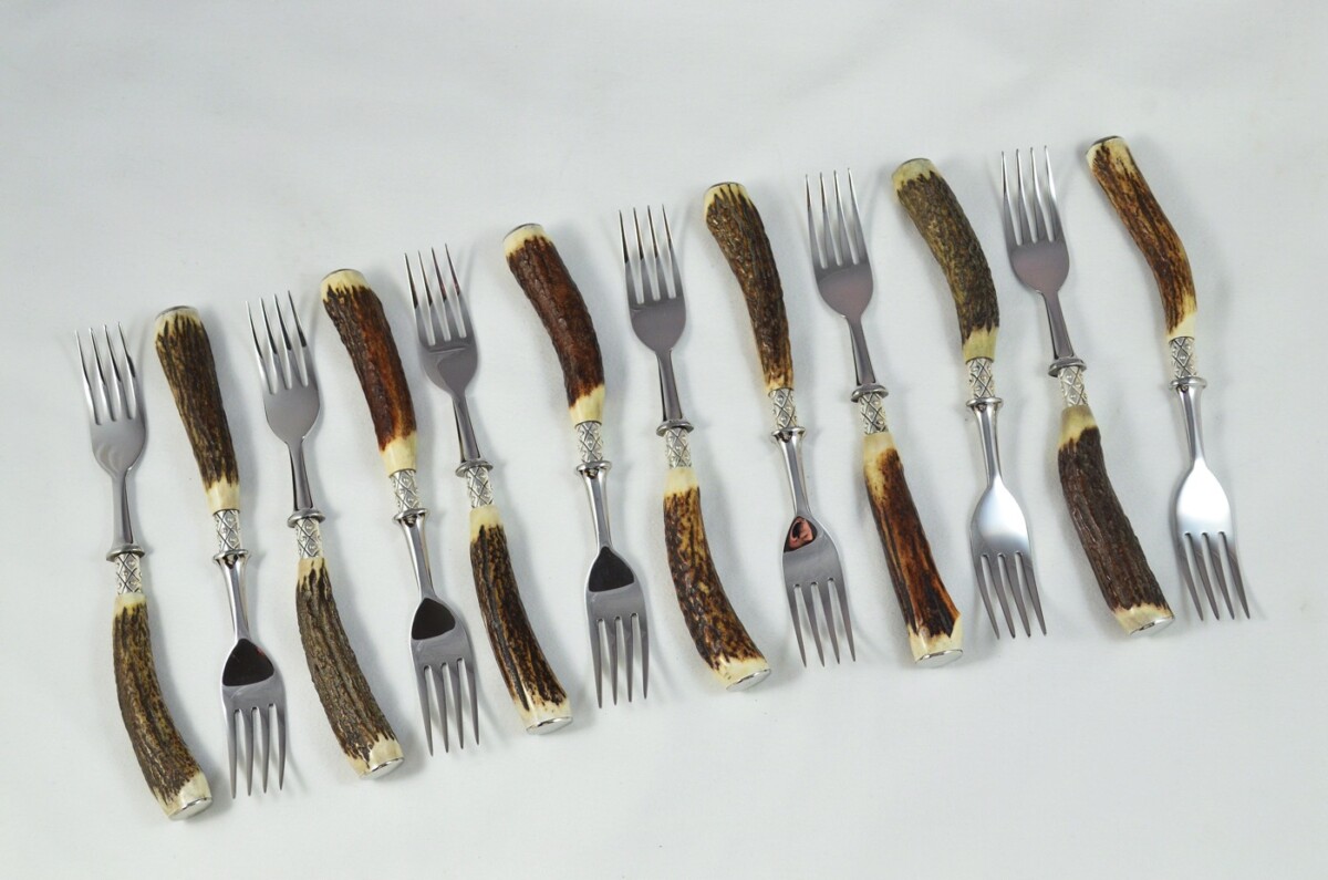 A Set of 12 Sheffield Silver Ferruled Steak Forks with Red Deer Stag Antler Handles