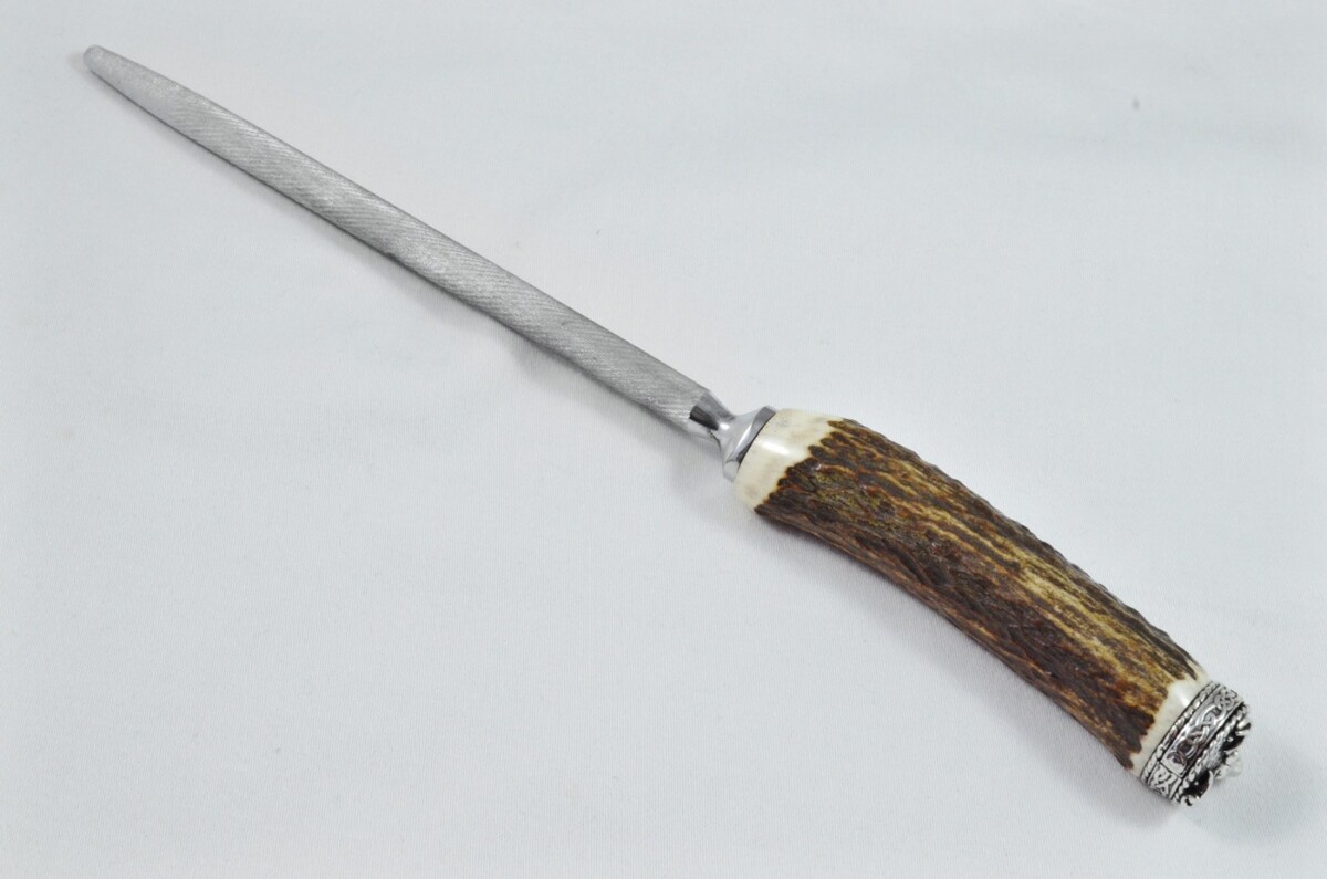 A Genuine Stag Antler Handled Pewter Capped Sharpening Steel Made In Sheffield England